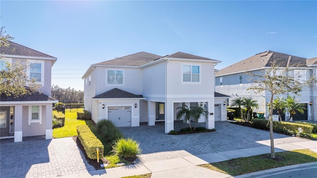 view of front of property with a garage