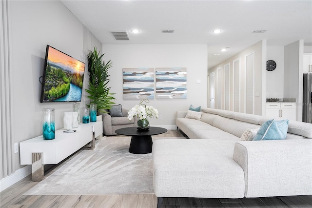 living room featuring light hardwood / wood-style flooring