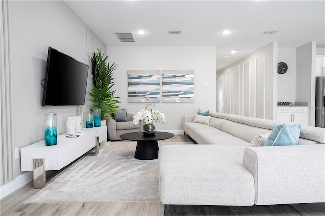 living room with light wood-type flooring