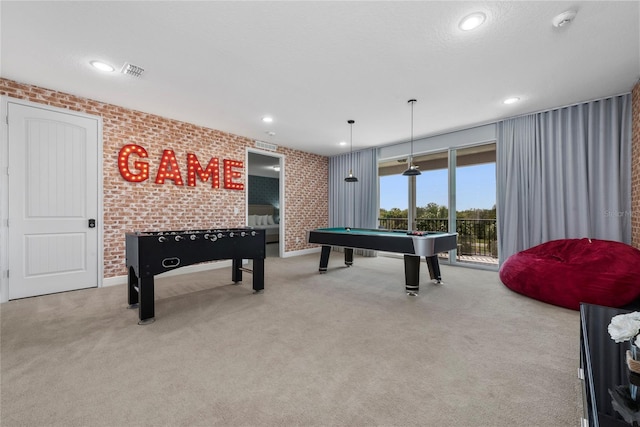 game room with brick wall, carpet flooring, and billiards