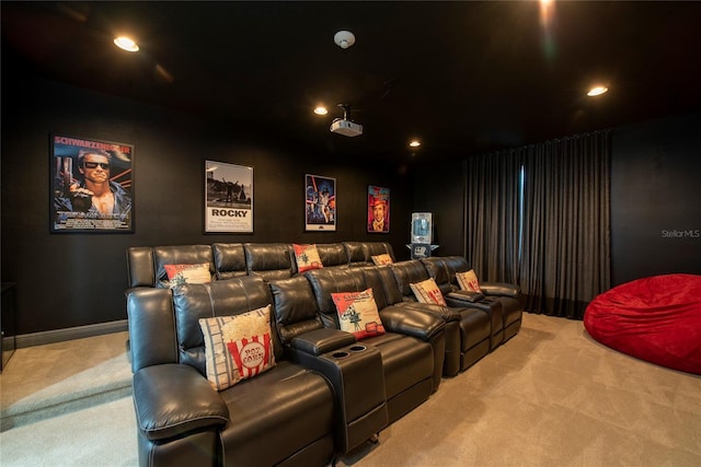 cinema room featuring light carpet