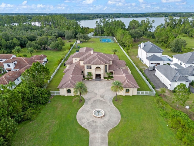 bird's eye view with a water view