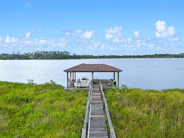 view of dock with a water view