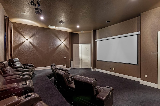 carpeted cinema with a textured ceiling