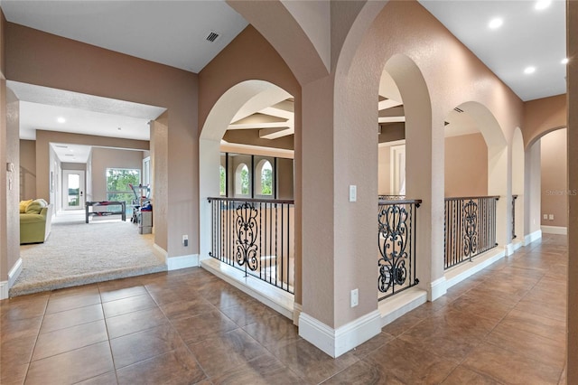 corridor with tile patterned floors