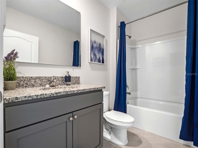 full bathroom with vanity, toilet, tile patterned flooring, and shower / bath combo