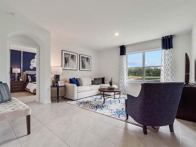 living room with light tile patterned floors