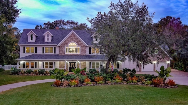 view of front of home with a lawn