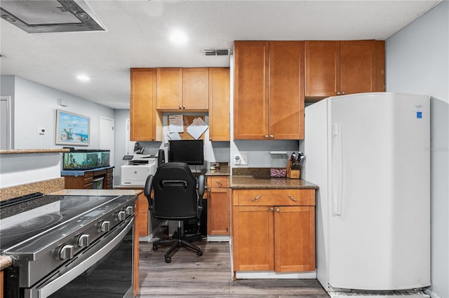 office space featuring dark hardwood / wood-style floors and a textured ceiling