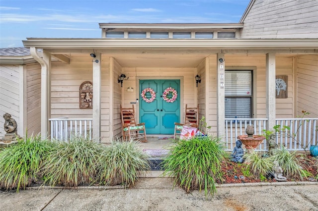 property entrance with covered porch