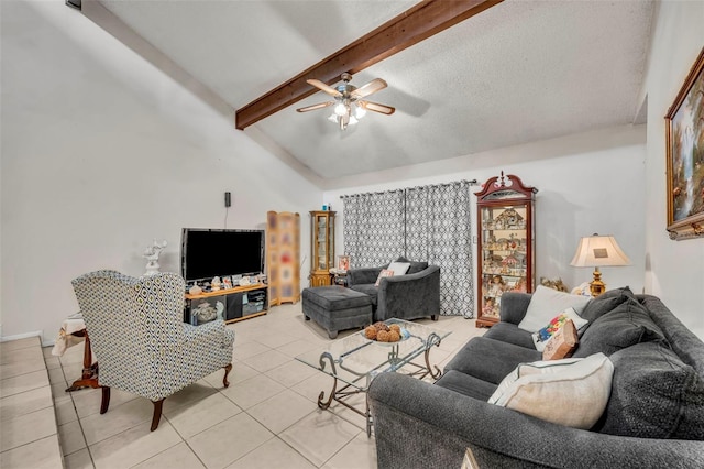 living room with light tile patterned floors, high vaulted ceiling, beamed ceiling, and a ceiling fan