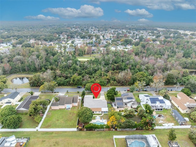 aerial view featuring a water view and a residential view