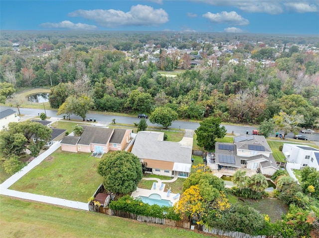 birds eye view of property featuring a residential view and a water view