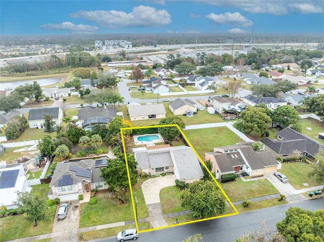 aerial view featuring a water view and a residential view