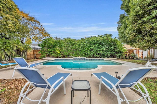 view of swimming pool with a fenced in pool, a patio area, and a fenced backyard