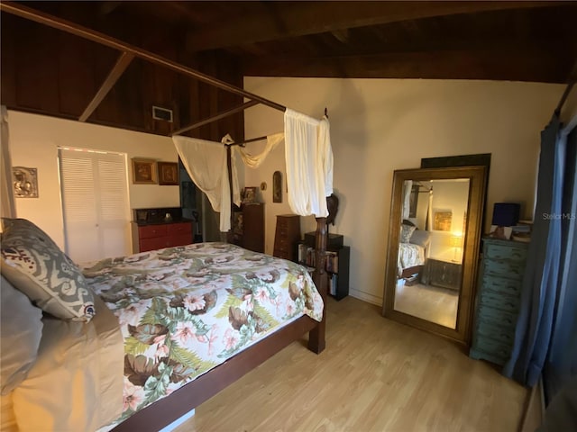 bedroom featuring light wood-type flooring and a closet