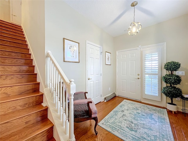 foyer with hardwood / wood-style flooring