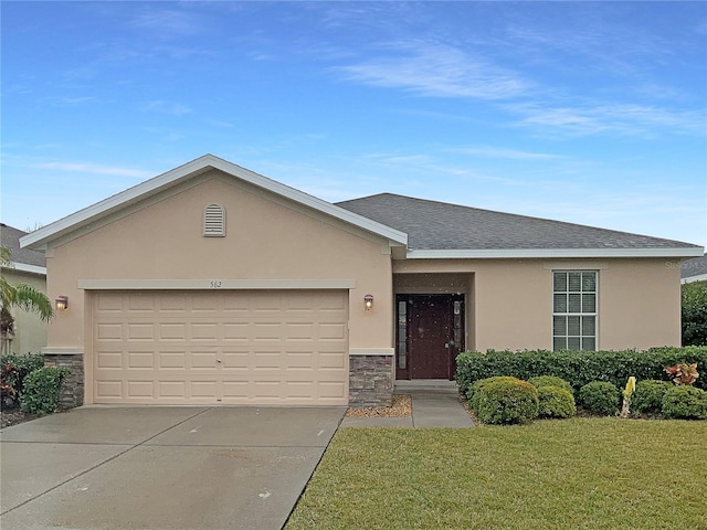 ranch-style house featuring a garage and a front lawn