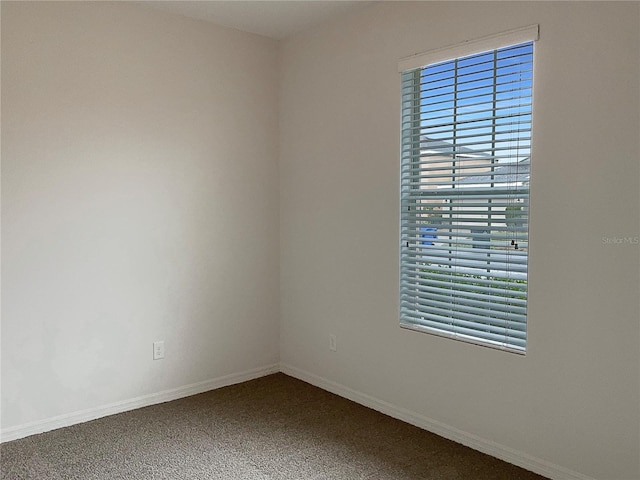 view of carpeted spare room