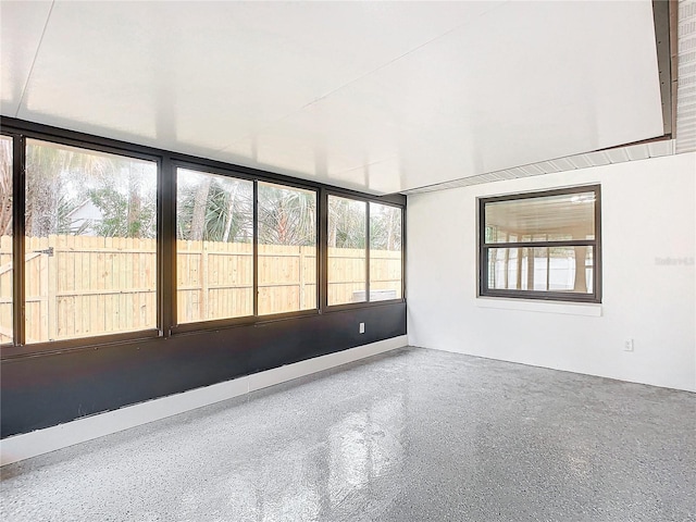 unfurnished sunroom with a healthy amount of sunlight