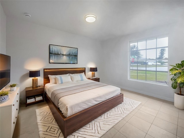 bedroom featuring light tile patterned floors