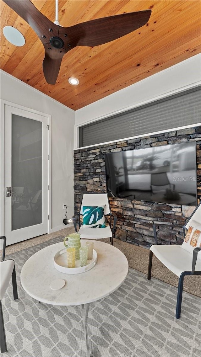 living room featuring wooden ceiling