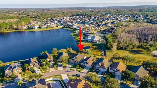 birds eye view of property featuring a water view