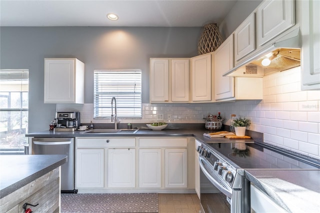 kitchen featuring white cabinetry, appliances with stainless steel finishes, sink, and exhaust hood