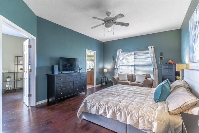 bedroom featuring ceiling fan, a textured ceiling, and dark hardwood / wood-style flooring