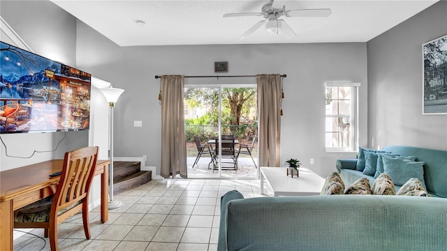 tiled living room with ceiling fan