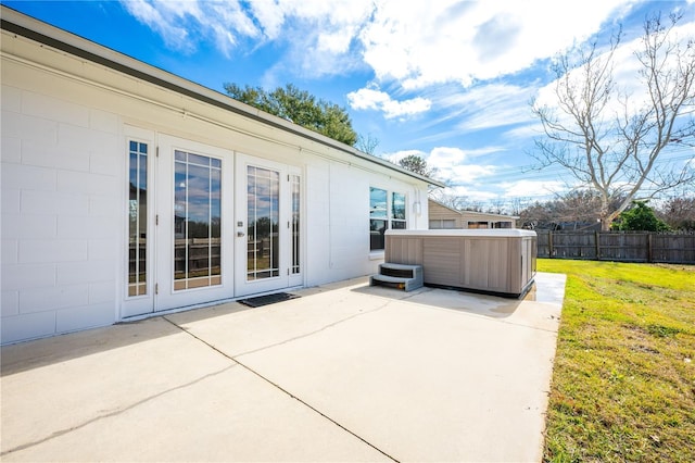 view of patio with a hot tub