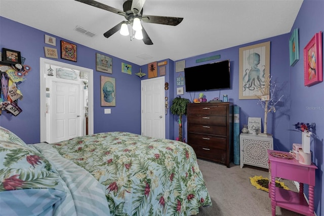 carpeted bedroom featuring ceiling fan