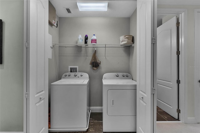 laundry area with washer and dryer