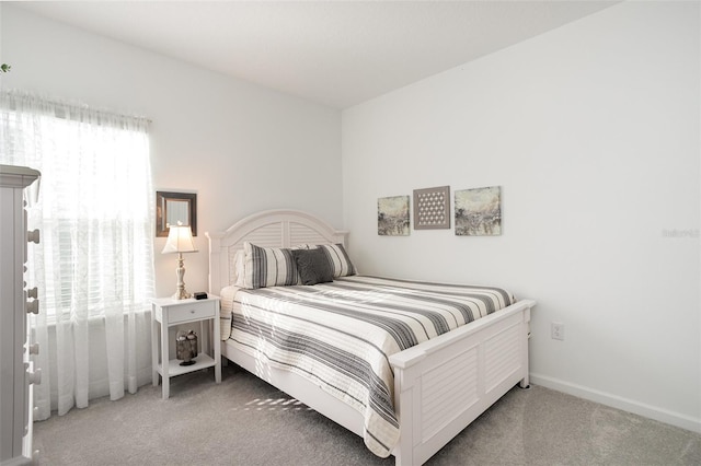 bedroom featuring carpet