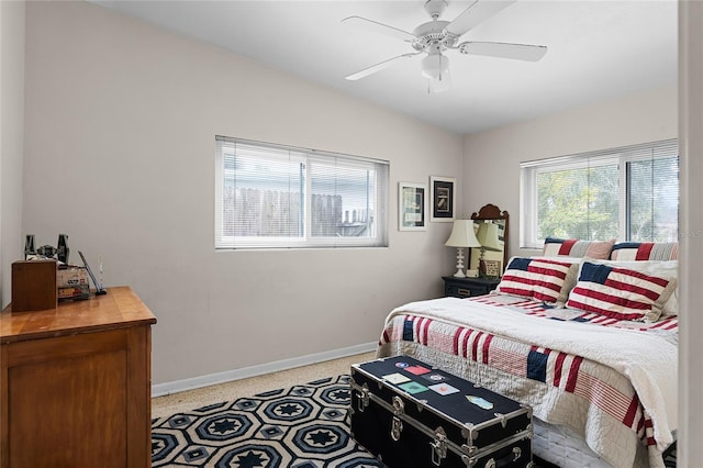 bedroom with vaulted ceiling and ceiling fan