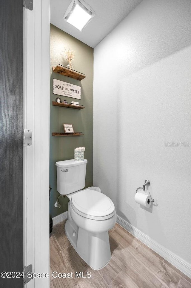 bathroom featuring toilet