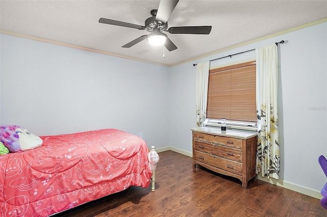 bedroom featuring crown molding, dark hardwood / wood-style floors, and ceiling fan