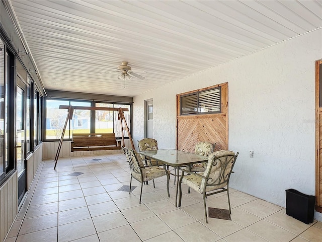 sunroom / solarium with ceiling fan