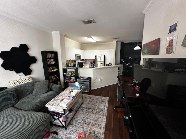 living room featuring crown molding, dark wood-type flooring, and a textured ceiling