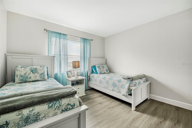 bedroom featuring light hardwood / wood-style flooring