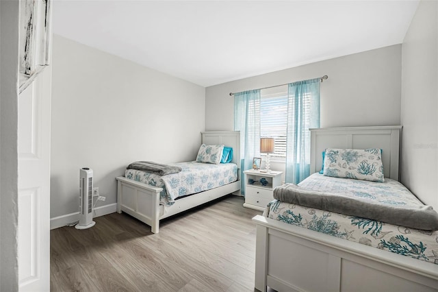 bedroom featuring light hardwood / wood-style flooring