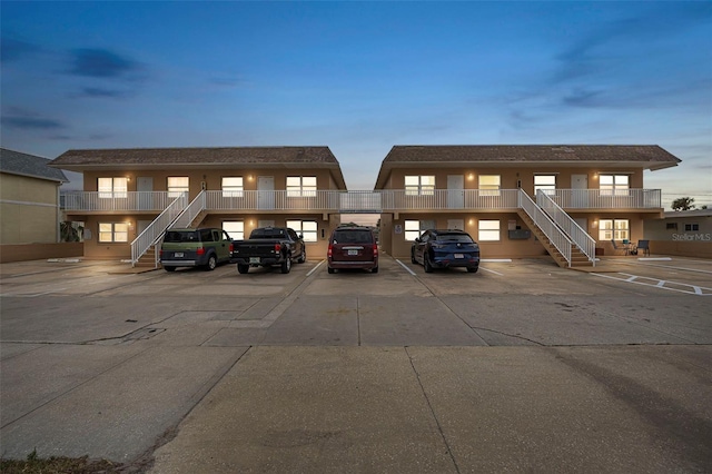 view of outdoor building at dusk