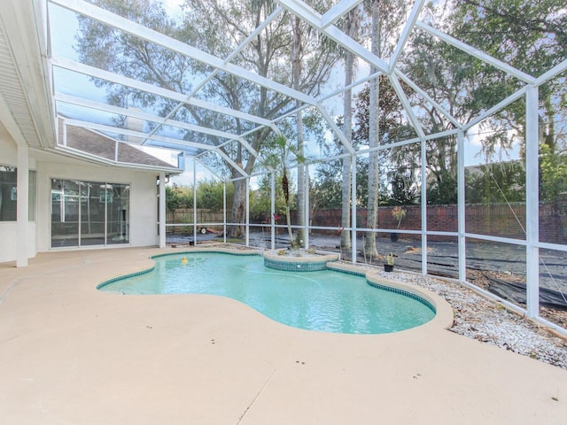 view of pool featuring a lanai and a patio area