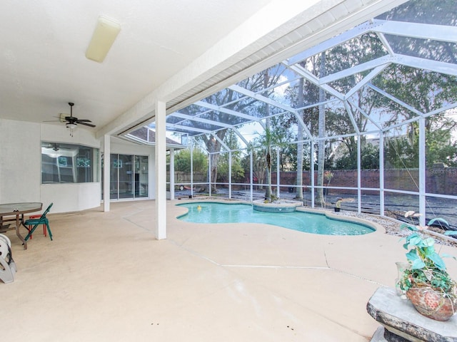 view of pool featuring a lanai, a patio, and ceiling fan