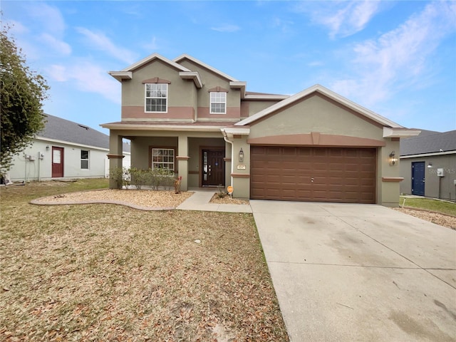 view of front of home with a porch, a garage, and a front lawn