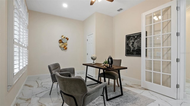 office area with ceiling fan