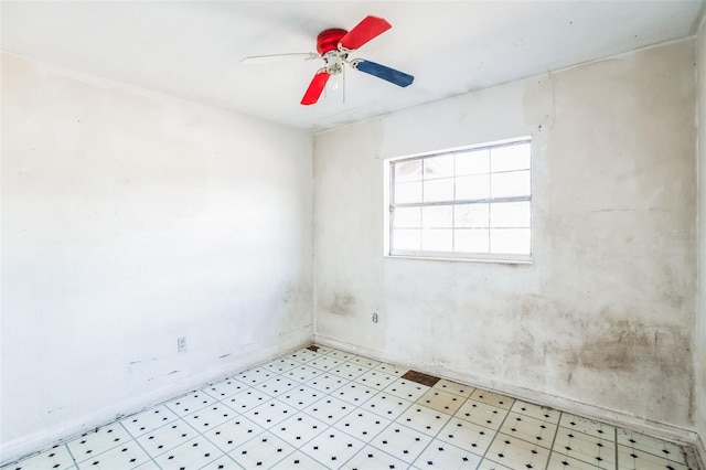 empty room featuring ceiling fan