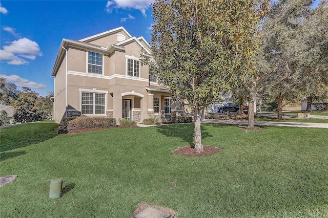 view of front of home featuring a front yard