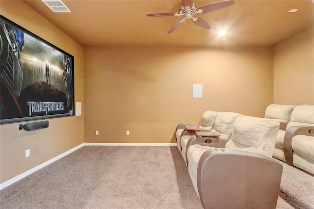 carpeted cinema with ceiling fan