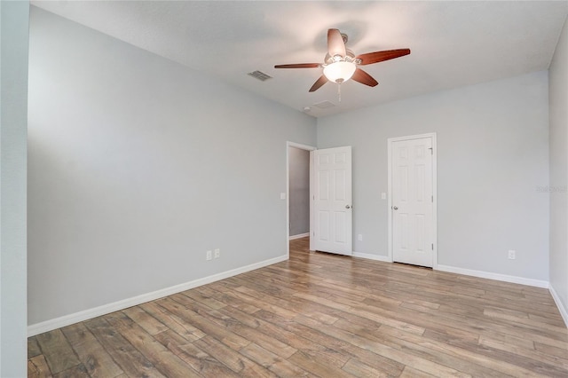 interior space with ceiling fan and light hardwood / wood-style floors